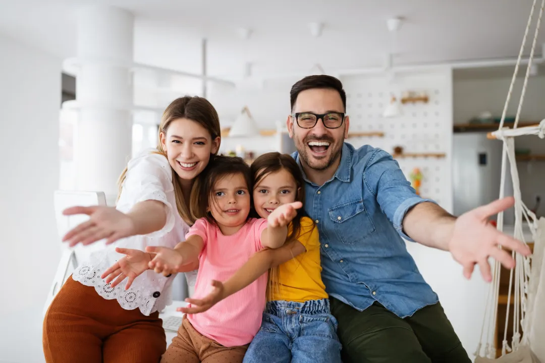 Happy family having fun times at home